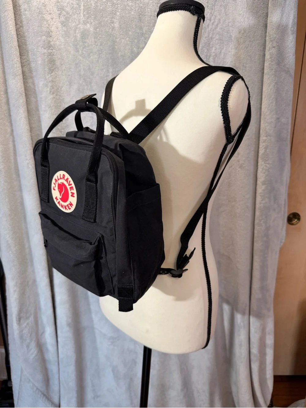 Fjallraven Kanken Mini Backpack in Black with Red Logo
